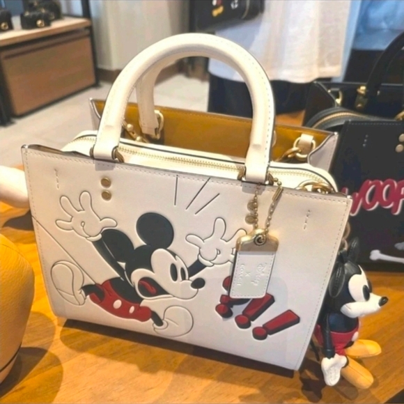 Coach Handbags - Disney X Coach Swinger Bag In Regenerative Leather With Mickey Mouse